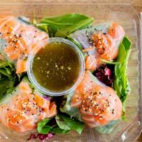 Salmon Fresh Roll · Fresh salmon, organic mixed salad, cucumbers, cilantro, carrots, lettuce iceberg, purple cab...