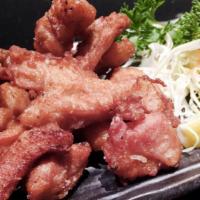 103. Chicken Karaage · Japanese style crispy fried chicken with special house sauce.