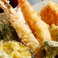 111. Shrimp & Vegetable Tempura · Two pieces of prawn and assorted vegetables dipped in light batter.
