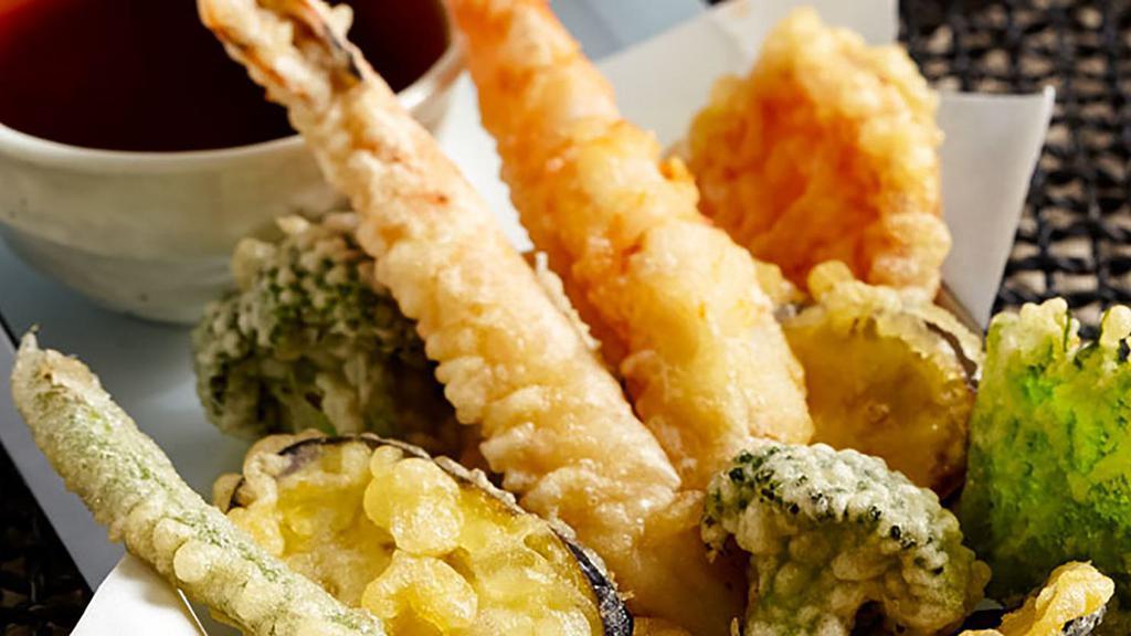 111. Shrimp & Vegetable Tempura · Two pieces of prawn and assorted vegetables dipped in light batter.