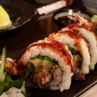 910. Spider Roll · Soft shell crab and vegetables, top with fish roe.