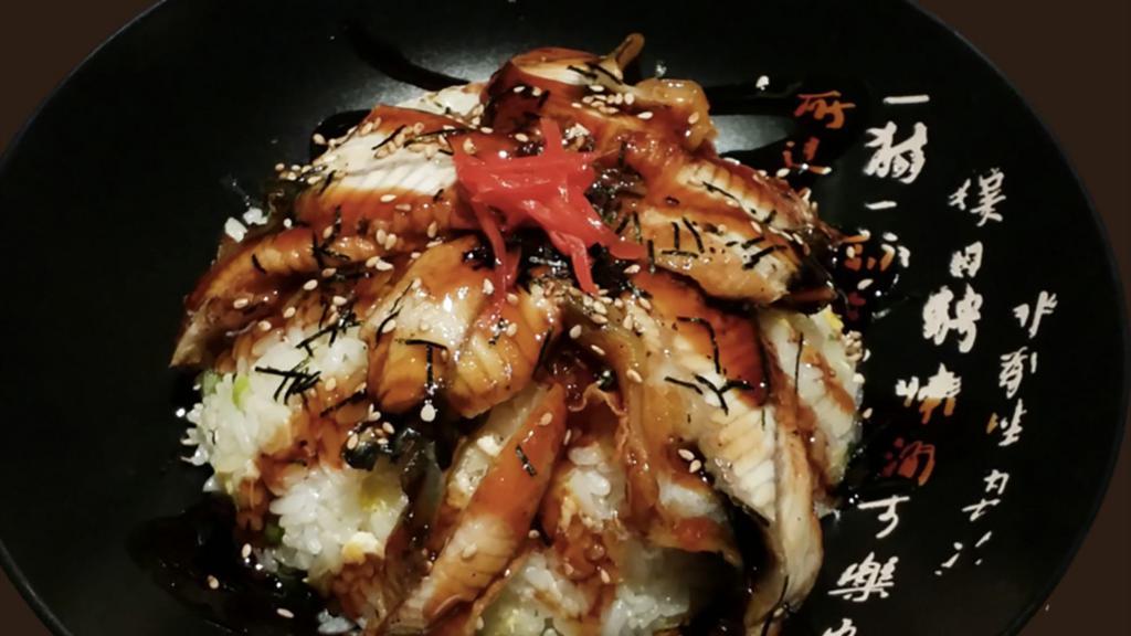 811. Unagi Fried Rice · Barbeque eel over fried rice with ega, unagi sauce, dried seaweed, sesame and green onion.