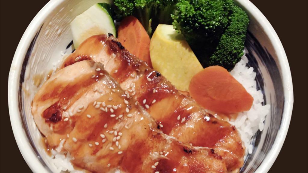 809. Salmon Teriyaki Don · Grilled or salt salmon served with house teriyaki sauce over rice.