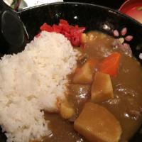 801. Curry Beef Rice · Beef with curry sauce over rice.