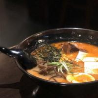606. Spicy Kenta Ramen · Spicy tonkotsu soup with stewed pork, chashu, tofu, fungus, seaweed, corn, egg, cilantro, an...