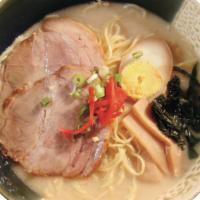 601. Tonkotsu Ramen · Milky pork flavor soup with sliced chashu, bamboo, fungus, egg, red ginger and green onion.