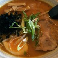 602. Miso Ramen · Bean paste pork flavor soup with sliced chashu, bamboo, bean sprouts, seaweed, egg and green...