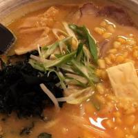 609. Miso Corn Butter Ramen · Bean paste pork flavor soup with sliced chashu, bamboo, bean sprouts, seaweed, egg, corn, bu...