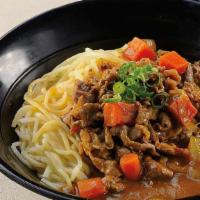 611. Curry Beef Ramen · Spicy. Curry beef over ramen, red pickle, and green onion.