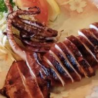 203. Ika Maruyaki · Grilled seasoned whole squid served with ginger and special house sauce.