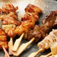 201. Yakitori · One skewer, chicken meat with green onion.
