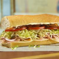 #8 Club Sub · Provolone, applewood smoked bacon, ham and raised without antibiotics turkey, mayo. Served M...