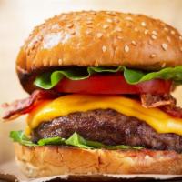 Bacon Cheeseburger · Mouthwatering burger topped with melted cheese, bacon, lettuce, pickles, onions, tomatoes, a...