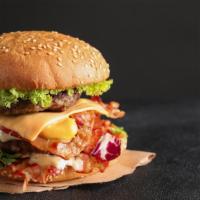 Double Bacon Cheeseburger · Mouthwatering Double Burgers topped with a double portion of melted cheese, bacon, lettuce, ...