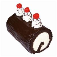 Fudge Roll Cake · Delight in a classic combination of ice cream and chocolate cake rolled together and delicio...