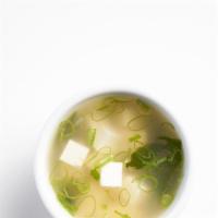 Miso Soup [V.GF] · All natural vegan miso soup w/ tofu, green onion & wakame seaweed.