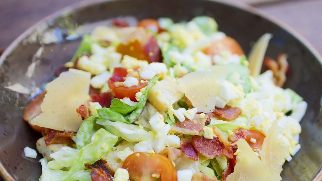 House Salad · Bibb lettuce, applewood bacon, hard boiled egg, heirloom tomatoes, garlic croutons, shaved Parmesan