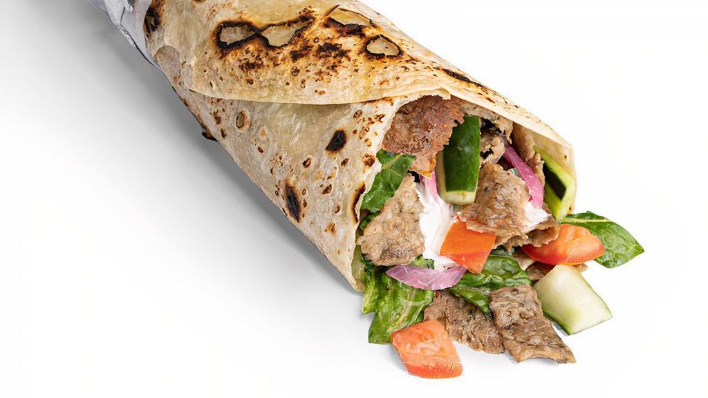 The Wrap · Comes with Garlic Yogurt, Greens, Tomato-Cucumber, and Pickled or Raw Onions.