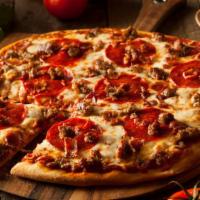 Mains Street Meat Lovers Pizza · A hefty pizza made for meat lovers. Our fresh, made daily pizza dough topped with seasoned g...