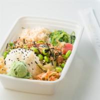 The Surfer · Base: White Rice	
Mix-Ins: Cucumber, Green Onion, White Onion	
Sides: Crab Salad, Seaweed Sa...