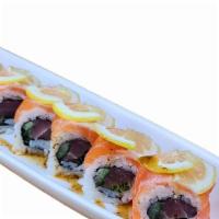 Doug's Special  Roll · NO SUBSTITUTION, INGS: Tuna,  Green Onion and Cucumber topped w/ Salmon and Sliced Lemon wit...