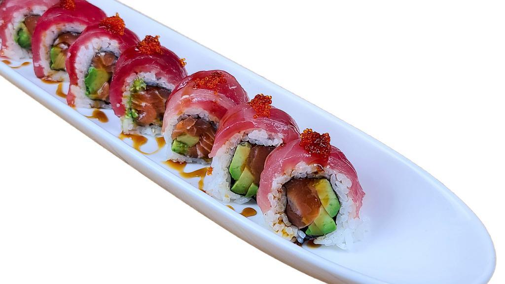 Cherry Blossom · NO SUBSTITUTION, INGS: Avocado, Salmon topped w/ Tuna, Tobiko, and Sauce
