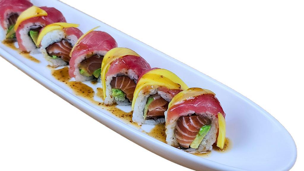 Tropical Roll · NO SUBSTITUTION, INGS: Salmon & Avocado topped with Red Tuna, Mango, and Sauce