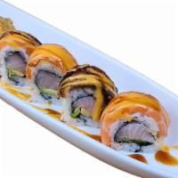 Tiger Roll · NO SUBSTITUTION, INGS: Hamachi, Avocado topped w/ Salmon, Unagi, and Sauce