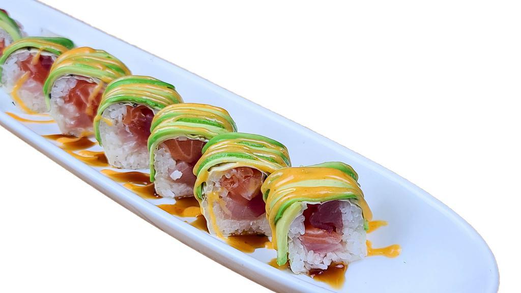T.G.I Friday · NO SUBSTITUTION, INGS: Tuna, Salmon, and Hamachi wrapped w/ Soy Wrap topped w/Avocado and Sauce