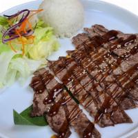 Rib Eye Steak Teriyaki · comes with salad and rice. NO SUBSTITUTIONS