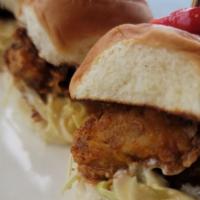 Oyster Po' Boy Sliders · Tempura Fried Oysters with harissa and furikake, house kewpie slaw, onion, and toasted Hawai...