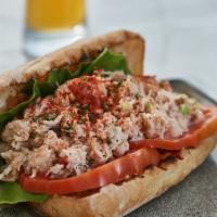 Crab And Shrimp Roll · Crab and shrimp on a grilled roll with leaf lettuce. Smoked paprika and old bay aloi served ...