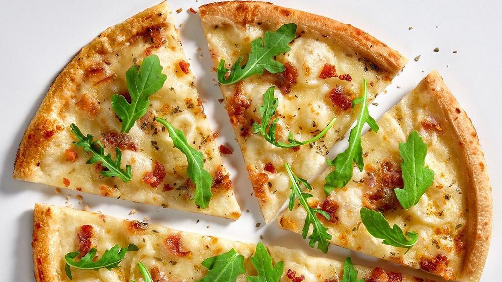 White Top (11-Inch) · Our Chef’s signature recipe includes white cream sauce with mozzarella, applewood bacon, chopped garlic, oregano and arugula. Limited substitutions. Want to customize with unlimited toppings? Try our Build Your Own Pizza instead!