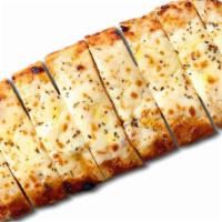Cheesy Bread · Our classic dough with shredded mozzarella, oregano, olive oil drizzle, two sides of red sauce