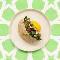 Falafel Hummus Pita · Fresh falafel served in a pita with hummus, cucumber, lettuce, tomatoes, onions and white sa...