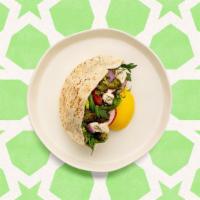Falafel Baba Ghanoush Pita · Fresh falafel served in a pita with baba ghanoush, cucumber, lettuce, tomatoes, onions and w...