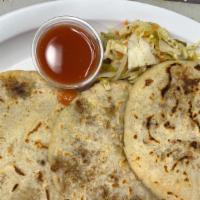 Pupusa Asada Con Queso/ Beef With Cheese · Thick griddle cake or flatbread from El Salvador and Honduras, made with cornmeal, cheese an...