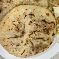 Pupusa Queso  · Thick griddle cake or flatbread from El Salvador and Honduras, made with cornmeal, cheese an...