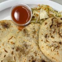Pupusa Revuelta / Combined · Thick griddle cake or flatbread from El Salvador and Honduras, made with cornmeal, cheese an...
