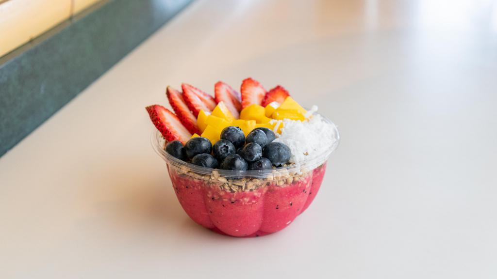 Pitaya Bowl · Blend: Pitaya, mango, pineapple, watermelon. Toppings: mango, strawberries, blueberries, granola, coconut.
