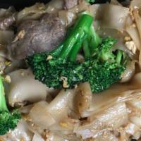 #62. Pad Se Ew · Flat rice noodles with your choice of meat, broccoli and egg.