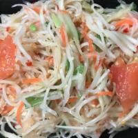 #73. Papaya Salad Jay · Spicy. Shredded green papaya mixed with tomatoes, green beans, toasted peanuts, fresh lime j...