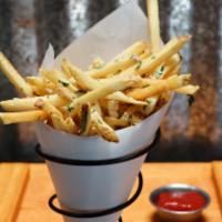 Rosemary Garlic Fries · Topped with parmesan cheese, rosemary, truffle oil & salt
