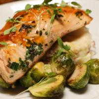 Cedar Plank Salmon · Roasted brussels, smashed red potatoes & chive lemon butter sauce