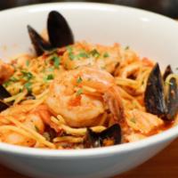 Puttanesca · Prawns, salmon, calamari, onions, garlic, Kalamata olives, capers, basil, spaghetti & tomato...
