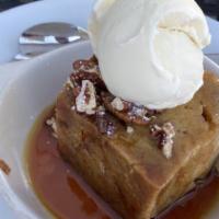 Chef's Pudding · Secret bourbon sauce, pecans & vanilla ice cream