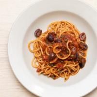 Homemade Spaghetti Puttanesca · black olives, garlic, caper, tomato sauce, parsley.