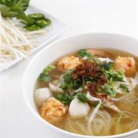 Seafood Pho · Gluten-free. Fresh shrimp, real crab claw meat, baby octopus, and topped with shaved white o...