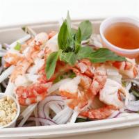 Lotus Root Salad · Mixed with shrimp, shredded carrots and daikon, shaved red onion, tossed with Vietnamese vin...