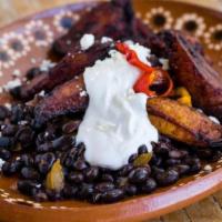 Platanos · Fried sweet plantains, Oaxaca refried beans, chipotle crema and queso